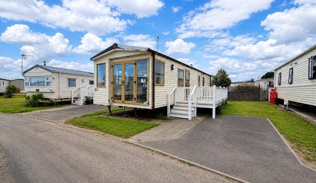 Great caravan with decking at Dovercourt Holiday Park ref 44002F