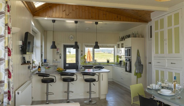 Large Bungalow sleeps 11. Beautiful views, big garden, lots of parking.
