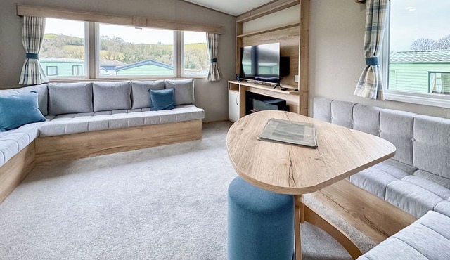 Luxury caravan with one double and one twin room.