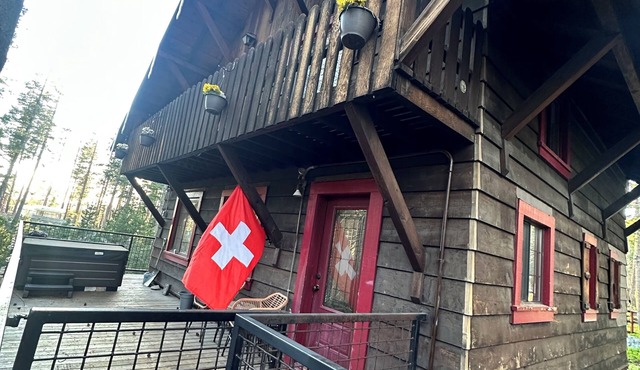 Magical riverfront Swiss-inspired Chalet with hot tub