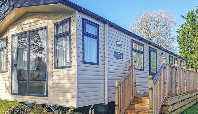 Modern caravan with one double and one twin.
