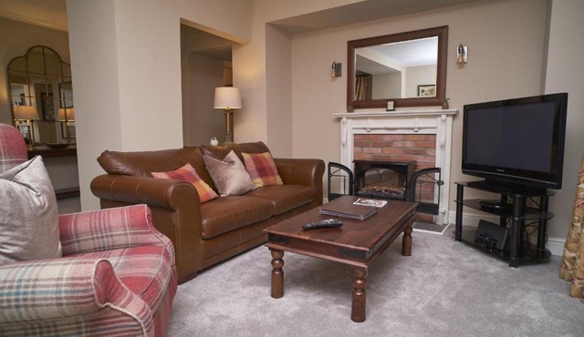 Old Bakers Cottage ground floor apartment centrally located in Grasmere with patio area