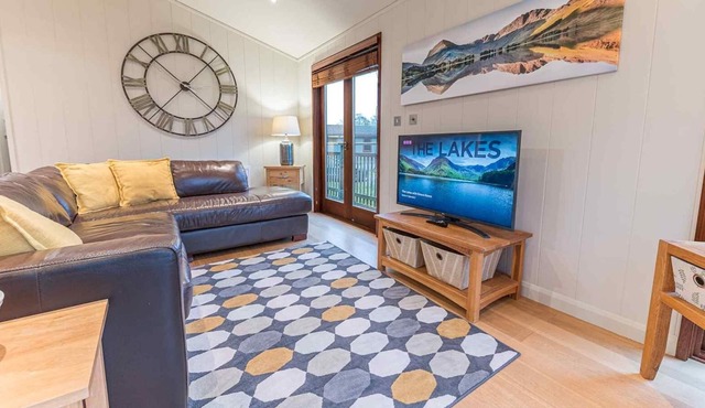 Pass the Keys | Lovely Lakeland lodge with private parking