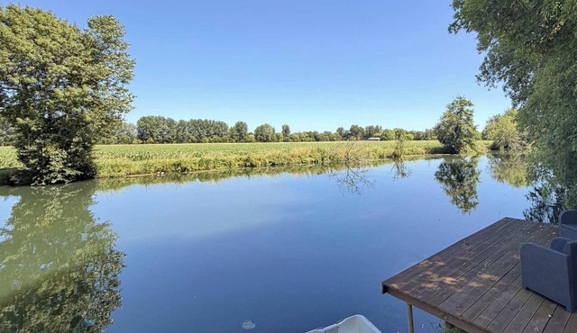 Private riverside villa with garden sleeps 8