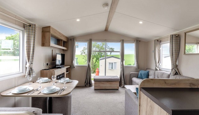 Silver Caravan with decking P