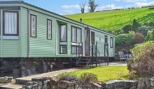 Traditional yet comfortable caravan with one double and two twins.